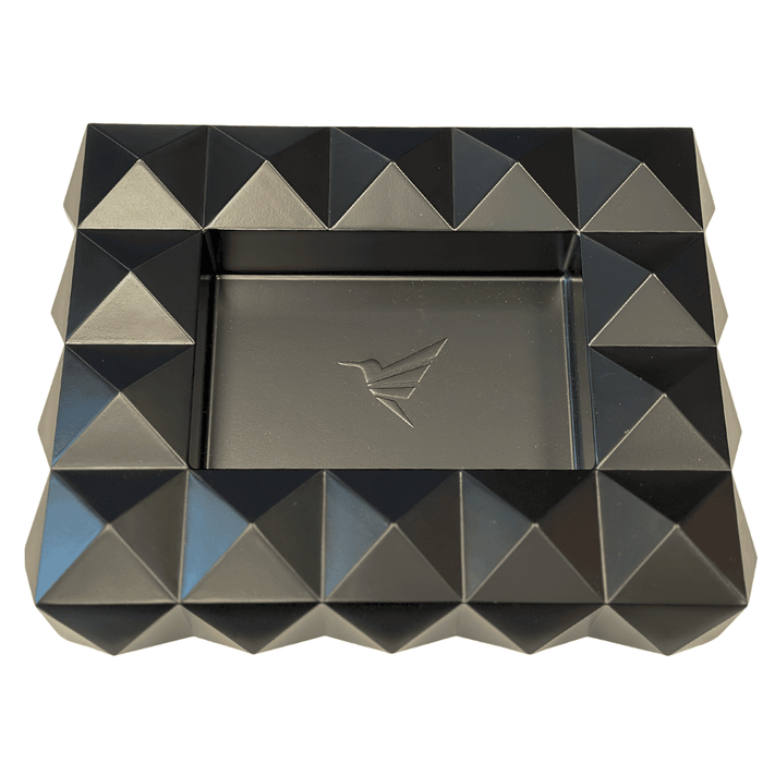 Colibri Quasar Rectangular Ashtray—a modern icon crafted for the cigar smoker who appreciates bold design and even bolder cigars. Featuring Colibri’s signature quasar pyramid motif