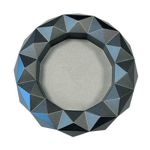  Colibri Quasar Round Ashtray - a sculpted centerpiece that turns every cigar session into a statement. Featuring Colibri’s signature quasar diamond design