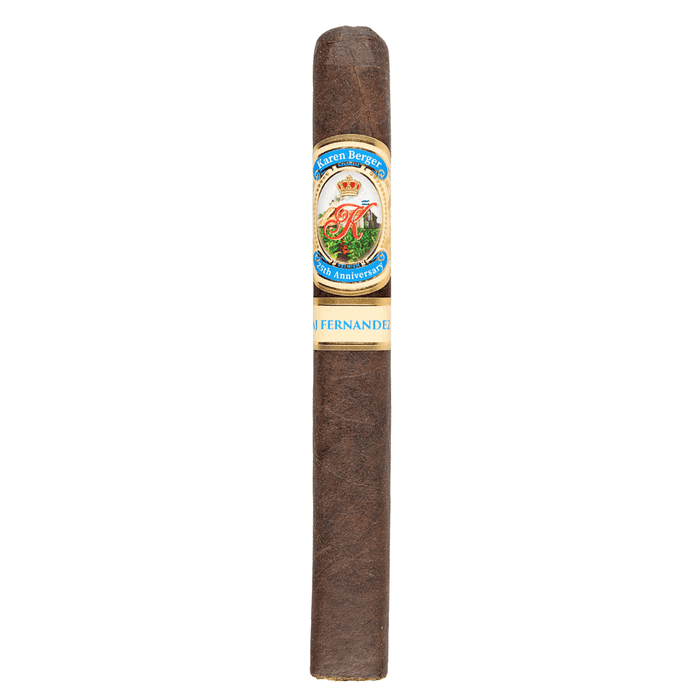 Karen Berger 25th Anniversary by AJ Fernandez Toro cigar standing upright against a white background, showcasing its dark brown Ecuadorian Habano wrapper and detailed gold, blue, and white band with the Karen Berger crest and “25th Anniversary” label