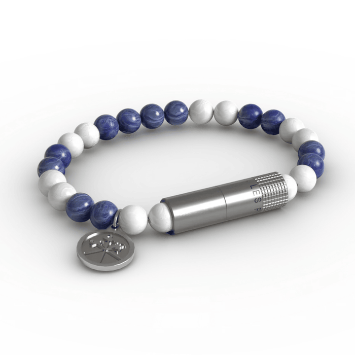 Les Fines Lames Punch Bracelet Caribe II Elastic with colorful elastic band and hidden stainless steel cigar punch displayed on a plain white background.