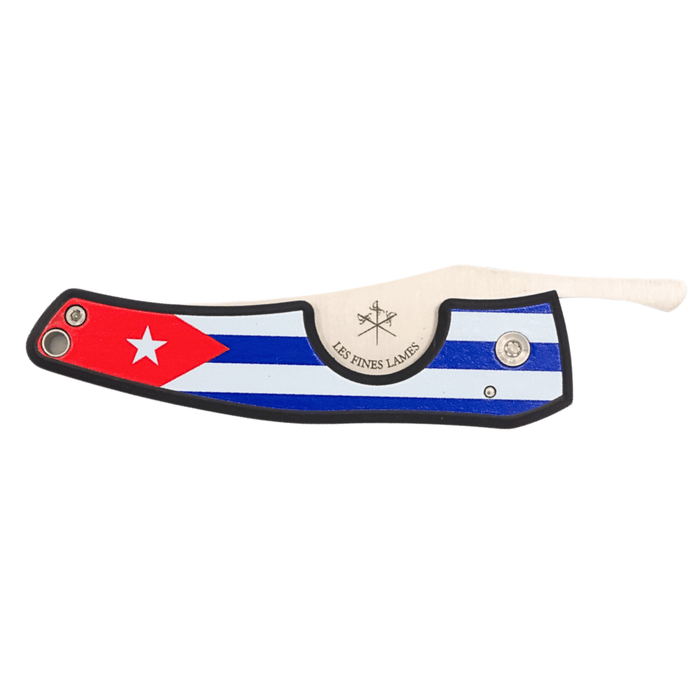 Les Fines Lames Le Petit cigar knife with dark finish and Cuban flag design displayed on a plain white background.