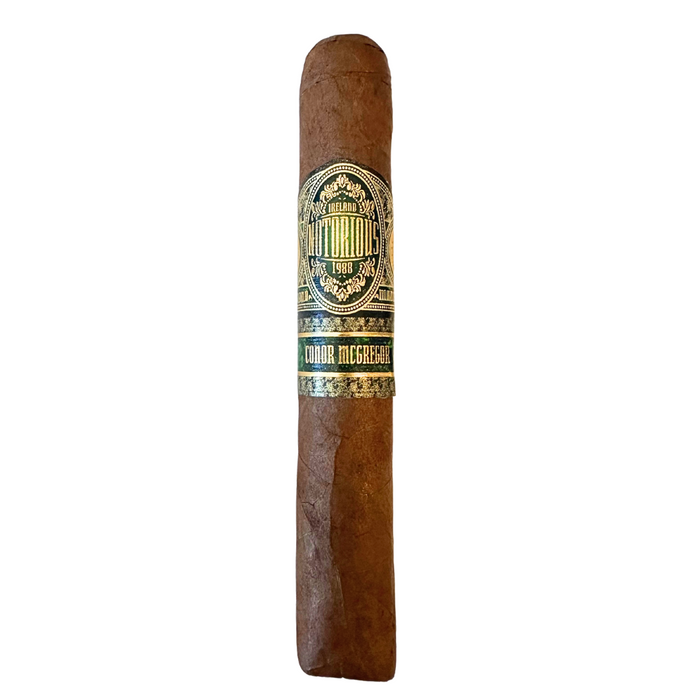 Crafted with bold character and attention to detail, Notorious by Conor McGregor marks the UFC icon’s debut in the cigar world.

This 5x54 double robusto features a rich Ecuadorian Habano 2000 rosado oscuro wrapper, aged for four years, wrapped around a Mexican San Andrés binder and a complex filler blend from Nicaragua’s Jalapa Valley and the Dominican Republic’s San Victor and Villa González regions.