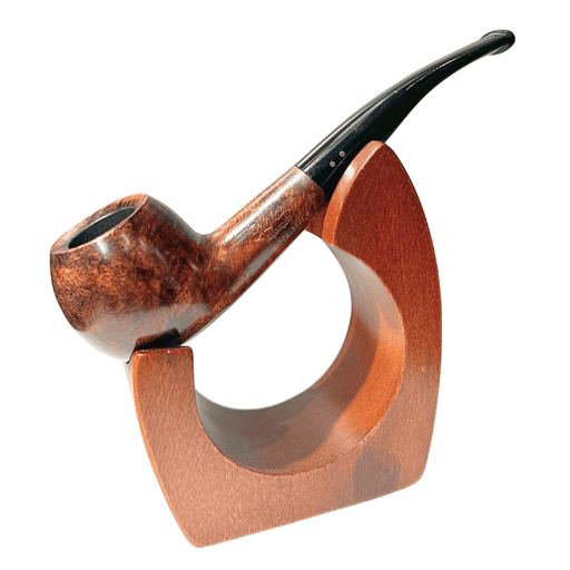 Crafted with care and character, the Brigham Algonquin 2‑Dot #229 is a bent apple pipe that offers both elegance and everyday durability. Made from premium Italian briar and finished in a warm chestnut gloss, it features Brigham’s signature double-dot stem and patented Rock Maple insert system. The result? A cool, dry smoke that reduces gurgle and tongue bite without muting the natural flavour of your tobacco.