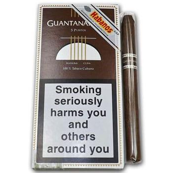 The Guantanamera range comprises light strength machine-made cigars using short filler tobacco from the lesser Vuelta Arriba region. Guantanamera cigars have pre-cut heads, a cigar cutter is not required.